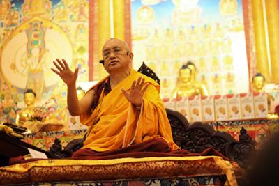 Lama Zopa Rinpoche teaching in Singapore, 2010. Photo: Tan Seow Kheng.