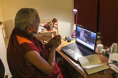 Lama Zopa Rinpoche giving bodhisattva vows over Skype to a student with ALS.