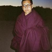 Lama Zopa Rinpoche at the beach, 1983