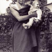 Lama Yeshe holding Zina's daughter, Rhea, in Darjeeling, 1967