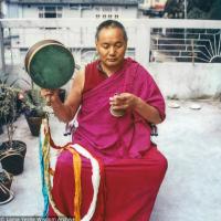 Lama practicing chod on the hotel roof