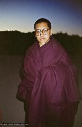 Lama Zopa Rinpoche at the beach, 1983