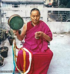 Lama practicing chod on the hotel roof